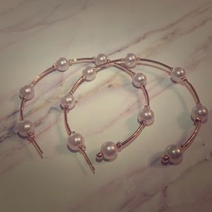 Gold hoop earrings with pearls